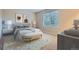 Comfortable bedroom with large window, neutral color scheme, and a plush rug to create a cozy atmosphere at 21767 Silver Meadow Ln, Parker, CO 80138