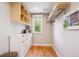 Well-organized closet with shelves, drawers and natural light at 2683 Bellaire St, Denver, CO 80207