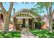 Beautiful brick home with mature trees, lush lawn and manicured landscaping at 2683 Bellaire St, Denver, CO 80207