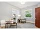 Office space with natural light, desk and chair at 2683 Bellaire St, Denver, CO 80207