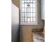 Kitchen counter and view of a stained glass window with colorful glass panes at 3147 Umatilla St, Denver, CO 80211