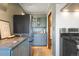 Modern kitchen features stainless steel appliances, granite countertops and stylish cabinetry at 3147 Umatilla St, Denver, CO 80211