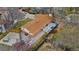 Aerial view of the home showcasing the spacious backyard with patio and hot tub at 11542 W 67Th Way, Arvada, CO 80004
