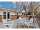 Relaxing backyard with patio, outdoor seating and fire pit perfect for enjoying the outdoors at 11542 W 67Th Way, Arvada, CO 80004