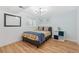 Bedroom with hardwood floors and ample natural light from the window at 11542 W 67Th Way, Arvada, CO 80004
