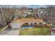 Charming single-Gathering home featuring well-maintained front yard with lush greenery and inviting entrance at 11542 W 67Th Way, Arvada, CO 80004