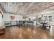 Bright open-concept space featuring a modern kitchen, and refinished hardwood floors at 11542 W 67Th Way, Arvada, CO 80004