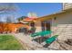 Backyard featuring a patio with an outdoor seating area, and a green picnic table at 5157 S Sedalia Ct, Centennial, CO 80015