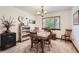 Formal dining room with carpet flooring, classic furnishings, and natural light at 5157 S Sedalia Ct, Centennial, CO 80015