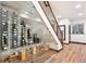 Modern wine cellar featuring glass walls, ample storage, and stylish design at 7804 Silverweed Way, Lone Tree, CO 80124
