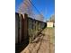 Fenced backyard with a well-maintained fence line, shed, and potential for gardening at 10438 Williams St, Northglenn, CO 80233