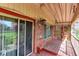 Cozy covered patio with a fountain, lattice accent, and sliding glass door access at 10438 Williams St, Northglenn, CO 80233