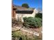 Exterior of a shed in the backyard with surrounding foliage, offering extra storage space at 10438 Williams St, Northglenn, CO 80233