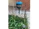 A SimpliSafe security sign is placed in front of a house, indicating home security at 10438 Williams St, Northglenn, CO 80233