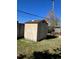 Exterior view of a shed in a backyard with grass at 10438 Williams St, Northglenn, CO 80233