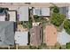 Aerial view of the roof and backyard with a patio shade structure and solar panels at 1121 S Ogden St, Denver, CO 80210