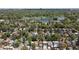 Aerial view of the neighborhood and lake in the distance at 1121 S Ogden St, Denver, CO 80210
