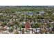 Aerial view of the neighborhood and lake in the distance with location indicator at 1121 S Ogden St, Denver, CO 80210