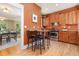 Efficient kitchen layout with stainless steel appliances, wood floors, and ample counter space at 1121 S Ogden St, Denver, CO 80210