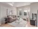 Cozy living room with hardwood floors, neutral decor, and ample natural light for a relaxing atmosphere at 2436 Welton St, Denver, CO 80205