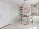 Light-filled office with built-in cabinets, stylish shelving, and modern decor for a productive space at 2436 Welton St, Denver, CO 80205