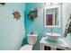 Powder room with a nautical theme and a modern vanity at 3914 S Perth St, Aurora, CO 80013