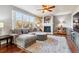 Bright living room with hardwood floors and a fireplace at 3914 S Perth St, Aurora, CO 80013