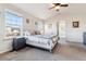 Main bedroom with vaulted ceiling, carpet and large windows at 3914 S Perth St, Aurora, CO 80013