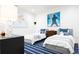 ' bedroom with twin beds, nautical theme, and world map art at 1110 Elm St, Denver, CO 80220