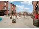Community courtyard with trees, seating, and stone accents at 4520 Broadway St # 208, Boulder, CO 80304