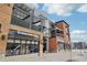 Building exterior features modern design and street-level retail at 4520 Broadway St # 208, Boulder, CO 80304