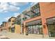 Modern building exterior with retail spaces on the ground floor at 4520 Broadway St # 208, Boulder, CO 80304