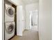 Convenient laundry room with stacked washer and dryer in a closet at 4520 Broadway St # 208, Boulder, CO 80304