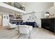 Open living area with high ceilings, fireplace, and modern furniture at 4520 Broadway St # 208, Boulder, CO 80304