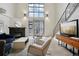 Modern living room with view and fireplace at 4520 Broadway St # 208, Boulder, CO 80304