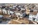 Charming aerial view of a suburban neighborhood showcasing modern homes with solar panels and well-maintained lawns at 9628 Dunning Cir, Highlands Ranch, CO 80126