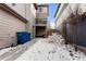 The backyard has multiple levels and a view of the main back deck and covered patio at 9628 Dunning Cir, Highlands Ranch, CO 80126