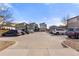 Spacious community parking lot with ample spaces and well-maintained surroundings for residents and visitors at 9628 Dunning Cir, Highlands Ranch, CO 80126