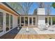 Stylish patio featuring an open-air atmosphere, wood accents, and rock details at 2545 S Lowell Blvd, Denver, CO 80219