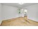 Large bedroom showcasing a window view and access to the home's bathroom vanity at 11267 W Colorado Pl, Denver, CO 80232
