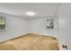 Spacious bedroom with neutral walls, carpet flooring, and ample natural light at 11267 W Colorado Pl, Denver, CO 80232