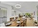 Spacious dining room with ample seating and an open view into the living area at 11267 W Colorado Pl, Denver, CO 80232