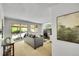 Comfortable living room with a fireplace, sliding glass doors and a gray sofa at 11267 W Colorado Pl, Denver, CO 80232