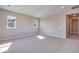 This spacious bedroom features neutral carpet, fresh paint, and recessed lighting at 3422 N Gold Bug Ct, Aurora, CO 80019