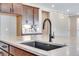 Kitchen island: modern sink fixture, storage, and ample counter space make it perfect for cooking and entertaining at 3422 N Gold Bug Ct, Aurora, CO 80019