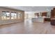 Bright living room features big windows, recessed lighting, and adjoins the spacious kitchen at 3422 N Gold Bug Ct, Aurora, CO 80019