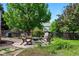 Backyard featuring an outdoor seating area, fire pit and garden at 3715 E 139Th Pl, Thornton, CO 80602