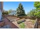 Backyard garden featuring four raised garden beds at 3715 E 139Th Pl, Thornton, CO 80602