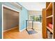 Well-lit office boasts hardwood floors, adjustable desk, and charming built-in shelving at 3715 E 139Th Pl, Thornton, CO 80602