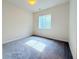 Bedroom features carpeting, window with natural light, and neutral paint at 94 Vale St, Palmer Lake, CO 80133